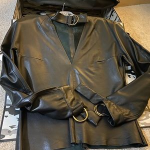 Adorable genuine leather top. Beautiful wore it twice.